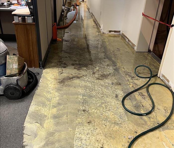 Standing water on the floor of an office building